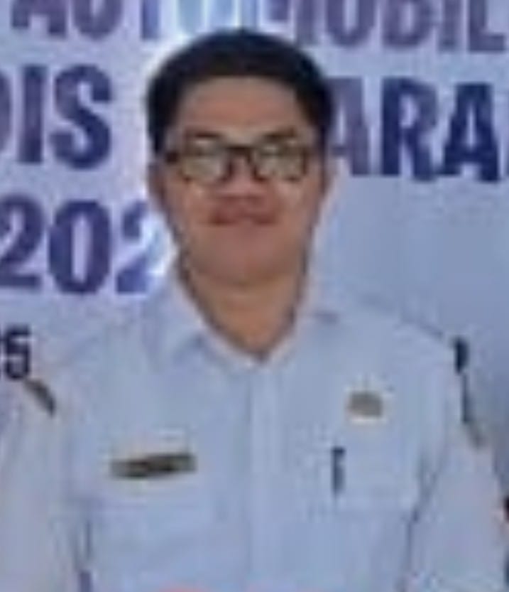 Keterangan foto : Kepala Sekolah SMK Negri 1 Pulau Rakyat Asahan M. Bahmid Effendi Pulungan, S, Pd . ( doc/istimewa )
